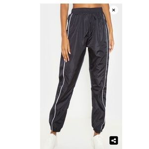 Black tracksuit bottoms